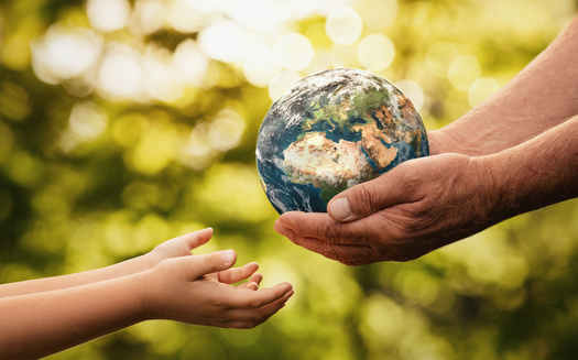 Advocates are asking lawmakers to honor Earth Day by supporting a bill to require oil and gas companies to contribute to a fund to fight climate change. (Rangizz/Adobe Stock)