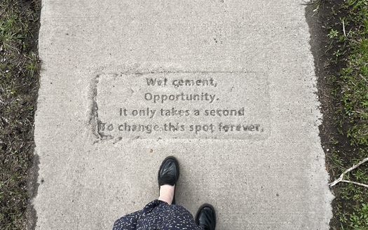 St. Paul's sidewalk poetry program has stamped enough forms of literary art onto wet concrete, everyone living in the city could walk to a sidewalk poem in under 10 minutes. (Photo courtesy of Alana Horton for Arts Midwest)
